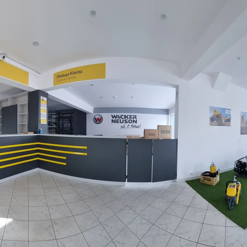Biuro Wacker Neuson z oznakowaniem ścian i lady recepcji